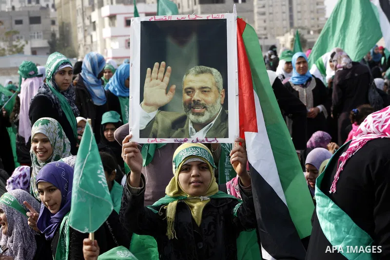 Thousands of Hamas supporters gather to celebrating marking the Islamist movement's 24nd anniversary at el-Qatiba yard in Gaza city on Dec 14, 2011. the Islamist movement of Hamas take over ruling at Gaza strip since Jun...