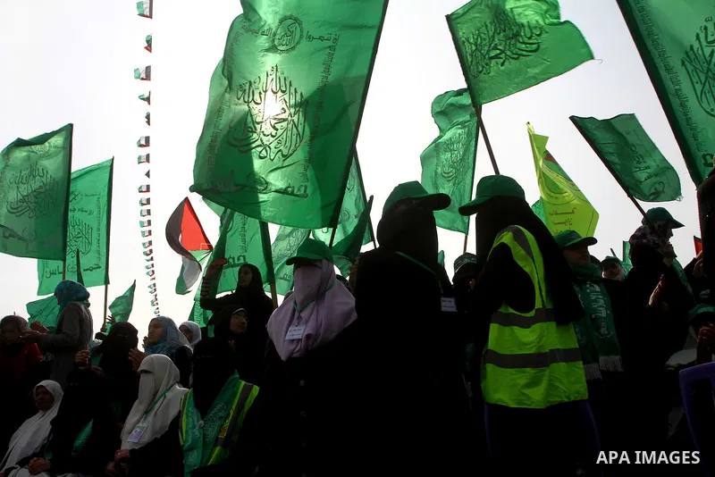 Thousands of Hamas supporters gather to celebrating marking the Islamist movement's 24nd anniversary at el-Qatiba yard in Gaza city on Dec 14, 2011. the Islamist movement of Hamas take over ruling at Gaza strip since Jun...