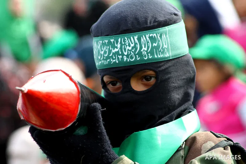 Thousands of Hamas supporters gather to celebrating marking the Islamist movement's 24nd anniversary at el-Qatiba yard in Gaza city on Dec 14, 2011. the Islamist movement of Hamas take over ruling at Gaza strip since Jun...