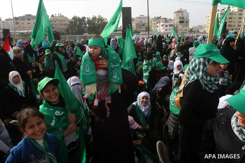 Thousands of Hamas supporters gather to celebrating marking the Islamist movement's 24nd anniversary at el-Qatiba yard in Gaza city on Dec 14, 2011. the Islamist movement of Hamas take over ruling at Gaza strip since Jun...
