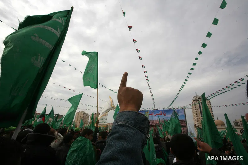 Thousands of Hamas supporters gather to celebrating marking the Islamist movement's 24nd anniversary at el-Qatiba yard in Gaza city on Dec 14, 2011. the Islamist movement of Hamas take over ruling at Gaza strip since Jun...