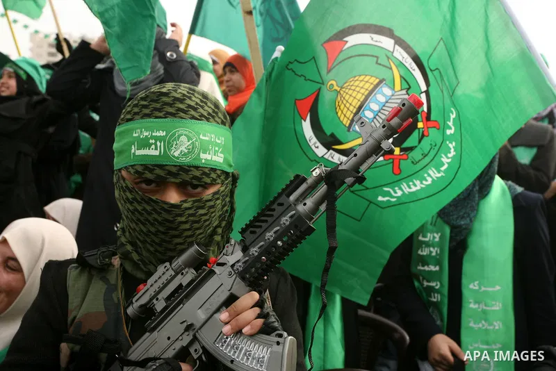 Thousands of Hamas supporters gather to celebrating marking the Islamist movement's 24nd anniversary at el-Qatiba yard in Gaza city on Dec 14, 2011. the Islamist movement of Hamas take over ruling at Gaza strip since Jun...