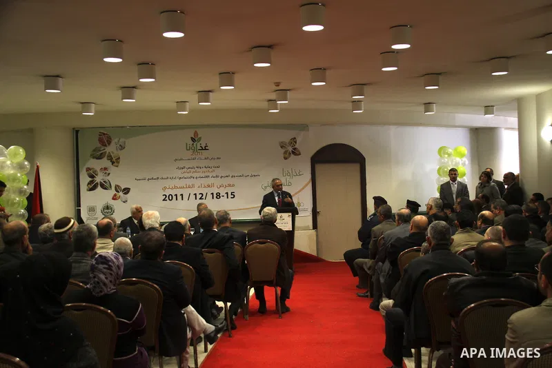 Palestinian Prime Minister Salam Fayyad attends the Palestinian Food Industries Association Week 2011 trade fair 'Our Food', from 15 to 18 December, in the West Bank City of Nablus, on 15 December 2011. 'Our Food' will c...