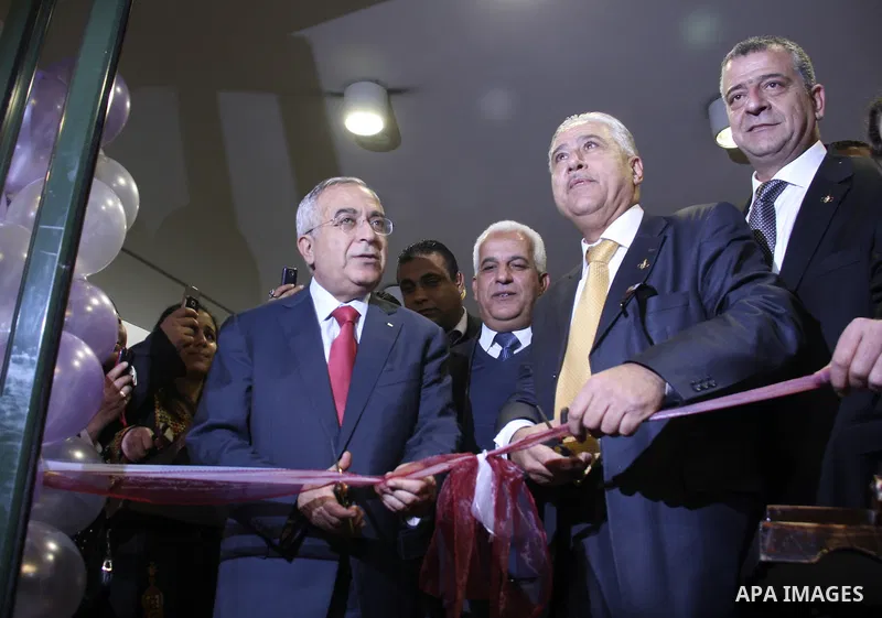 Palestinian Prime Minister Salam Fayyad attends the Palestinian Food Industries Association Week 2011 trade fair 'Our Food', from 15 to 18 December, in the West Bank City of Nablus, on 15 December 2011. 'Our Food' will c...