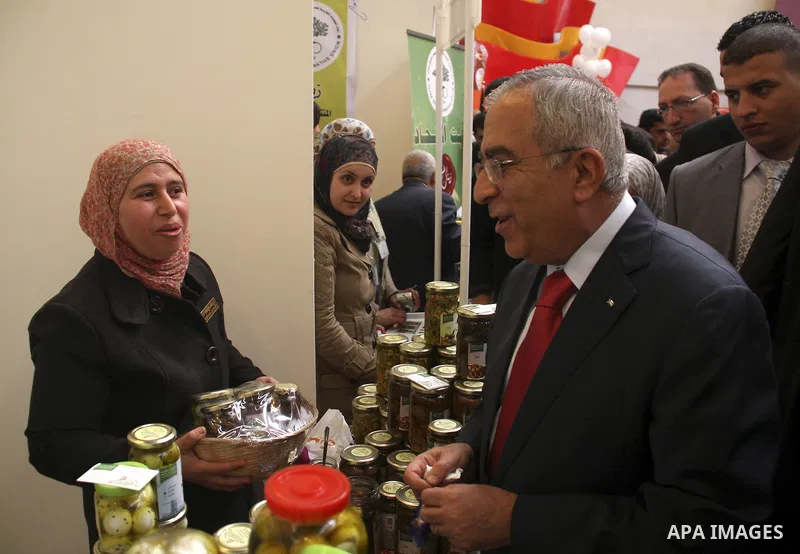 Palestinian Prime Minister Salam Fayyad attends the Palestinian Food Industries Association Week 2011 trade fair 'Our Food', from 15 to 18 December, in the West Bank City of Nablus, on 15 December 2011. 'Our Food' will c...