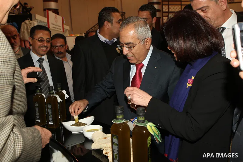 Palestinian Prime Minister Salam Fayyad attends the Palestinian Food Industries Association Week 2011 trade fair 'Our Food', from 15 to 18 December, in the West Bank City of Nablus, on 15 December 2011. 'Our Food' will c...