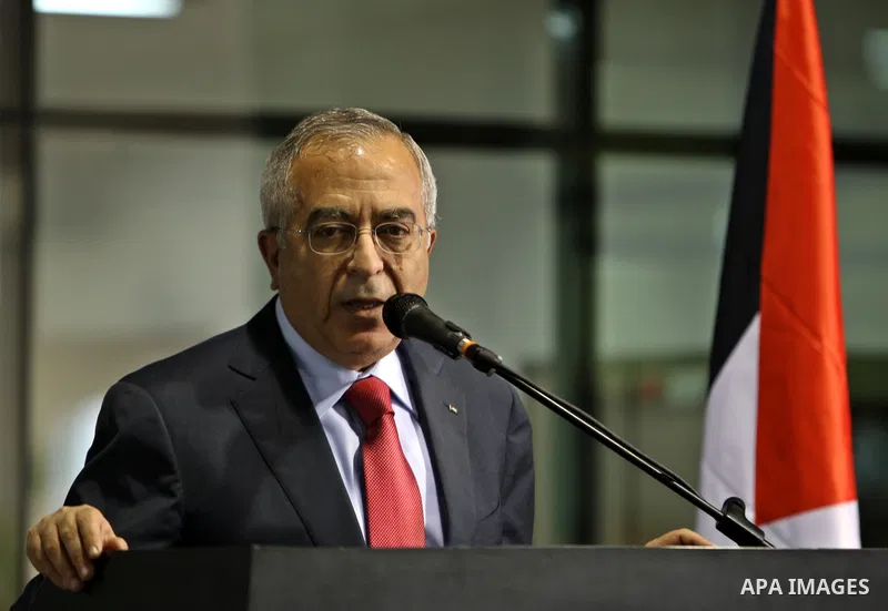 Palestinian Prime Minister Salam Fayyad attends the opening ceremony of the power station in the West Bank City of Nablus, on 15 December 2011.. Photo by Mustafa Abu Dayeh