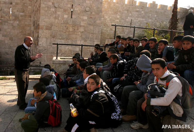Palestinian students visit the Al-Aqsa mosque compound in Jerusalem's old city, 15 December 2011. Photo by Mahfouz Abu Turk