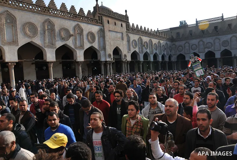 People at Al Azhar attend the funeral of Emad Effat, a senior official of Egypt's Dar al-Iftah who died in recent clashes, in Cairo December 17, 2011. Effat's wife Nashwa Abel-Fattah, told Reuters he died from a gunshot...