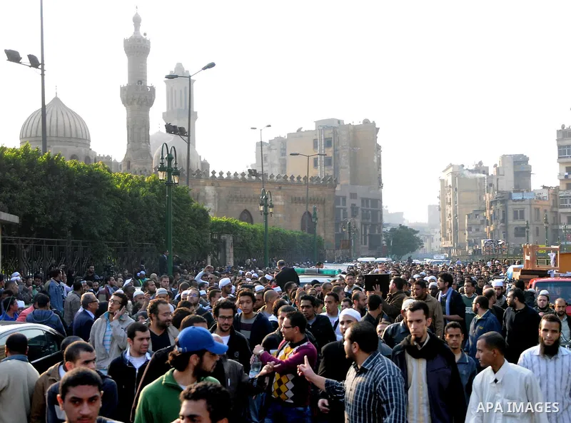 People at Al Azhar attend the funeral of Emad Effat, a senior official of Egypt's Dar al-Iftah who died in recent clashes, in Cairo December 17, 2011. Effat's wife Nashwa Abel-Fattah, told Reuters he died from a gunshot...