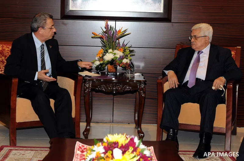 Palestinian President Mahmoud Abbas (Abu Mazen) meets with the Secretary General of the National Initiative, Mustafa Barghouti in the West Bank city of Ramallah on Dec. 18, 2011. Photo by Thaer Ganaim
