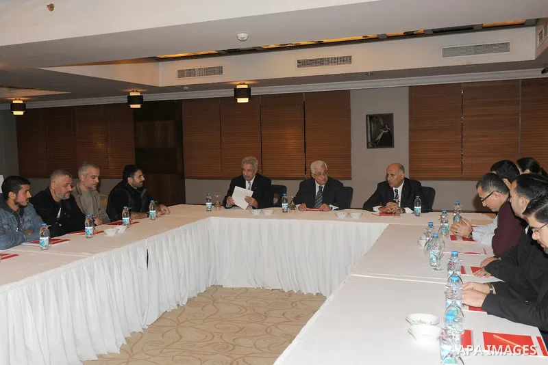 Palestinian President, Mahmoud Abbas (Abu Mazen) meets with Deportees Palestinian prisoners to Turkish in the capital "Ankara" On Dec. 20, 2011. Photo by Thaer Ghanaim