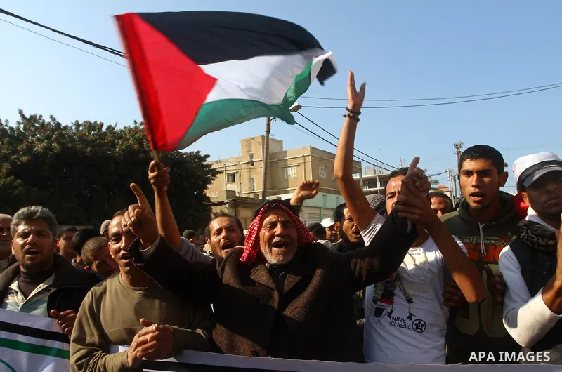 Palestinian fishermen take part in a protest in front of the Red Cross a protest against the Israel army assaults on fishermen in Gaza City, on Dec. 22. 2011. Photo by Ashraf Amra