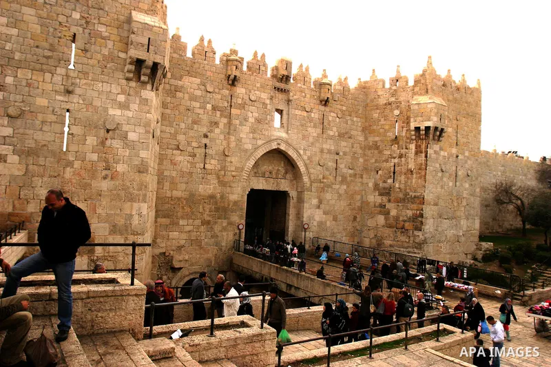 A Palestinians walk in front of the walk of the Rock at Al-Aqsa mosque compound in Jerusalem's old city on Dec. 22, 2011. Photo by Mahfouz Abu Turk