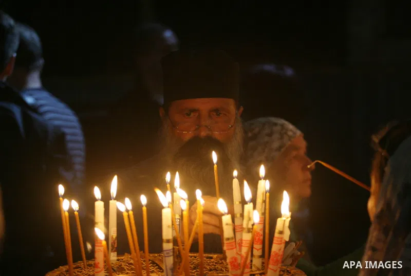 Christian pilgrims pray in the Church of the Nativity in the biblical West Bank city of Bethlehem on December 22, 2011, as Christian pilgrims started gathering in the traditional birthplace of Jesus Christ to attend the...