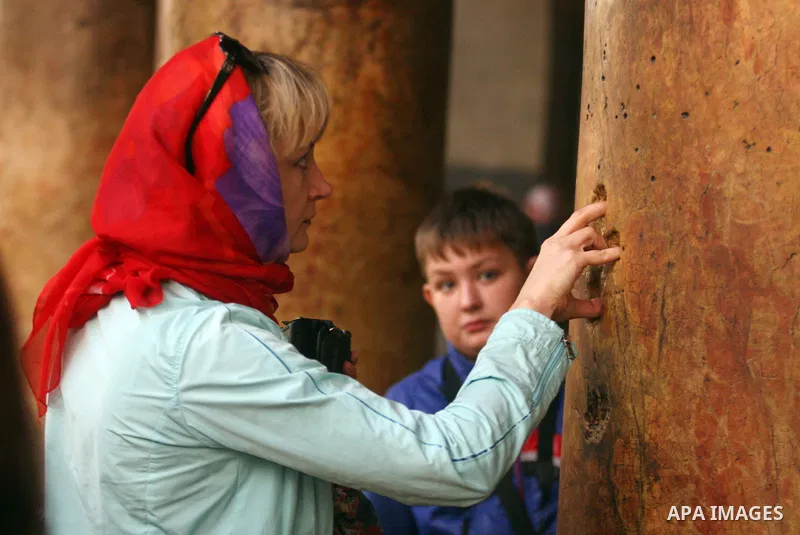 Christian pilgrims visit the Church of the Nativity in the biblical West Bank city of Bethlehem on 22 December 2011 as Christian pilgrims start gathering in the church belived to be the birthplace of Jesus Christ to cele...