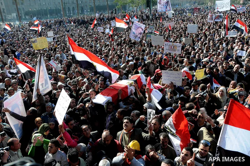 Egyptian protesters shout anti-military ruling council slogans during a protest at Tahrir Square, Cairo, Egypt Friday, Dec. 23, 2011. Several thousand Egyptians rallied in Cairo's central Tahrir Square Friday to denounce...