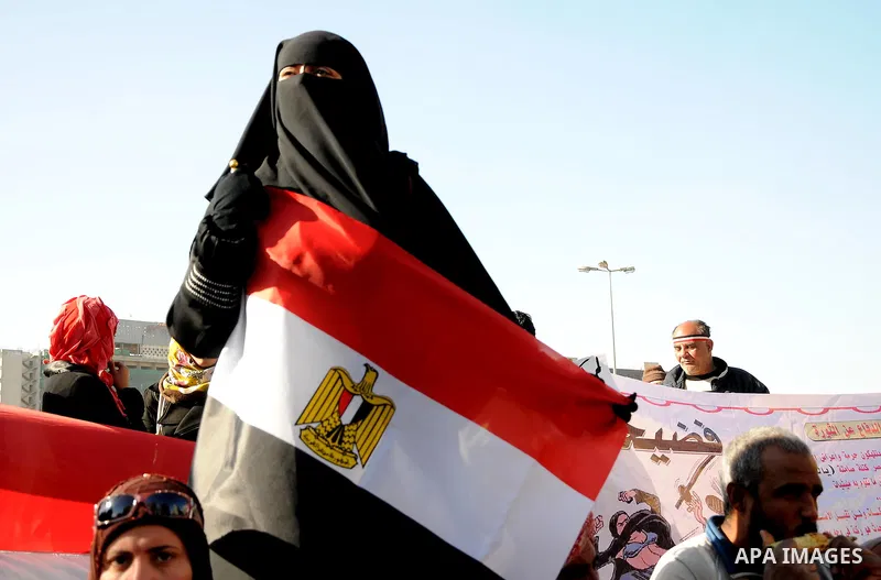 Egyptian protesters shout anti-military ruling council slogans during a protest at Tahrir Square, Cairo, Egypt Friday, Dec. 23, 2011. Several thousand Egyptians rallied in Cairo's central Tahrir Square Friday to denounce...