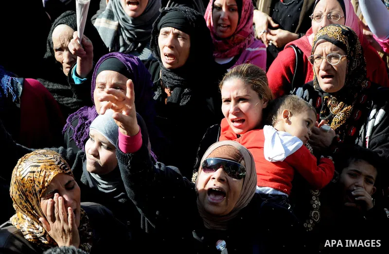 Egyptian protesters shout anti-military ruling council slogans during a protest at Tahrir Square, Cairo, Egypt Friday, Dec. 23, 2011. Several thousand Egyptians rallied in Cairo's central Tahrir Square Friday to denounce...