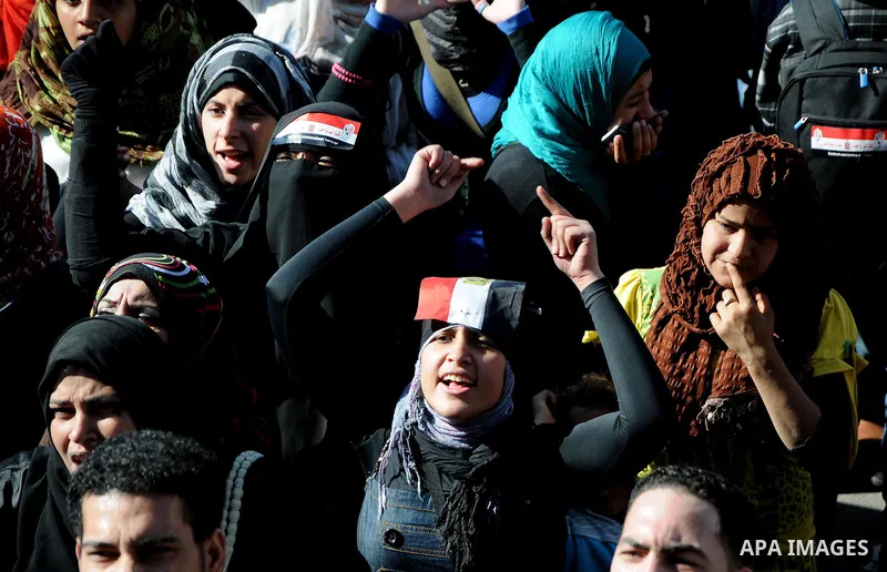 Egyptian protesters shout anti-military ruling council slogans during a protest at Tahrir Square, Cairo, Egypt Friday, Dec. 23, 2011. Several thousand Egyptians rallied in Cairo's central Tahrir Square Friday to denounce...