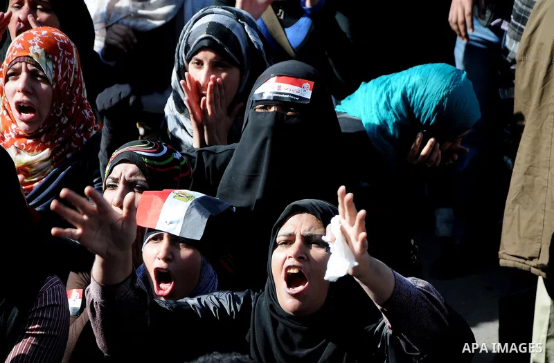 Egyptian protesters shout anti-military ruling council slogans during a protest at Tahrir Square, Cairo, Egypt Friday, Dec. 23, 2011. Several thousand Egyptians rallied in Cairo's central Tahrir Square Friday to denounce...