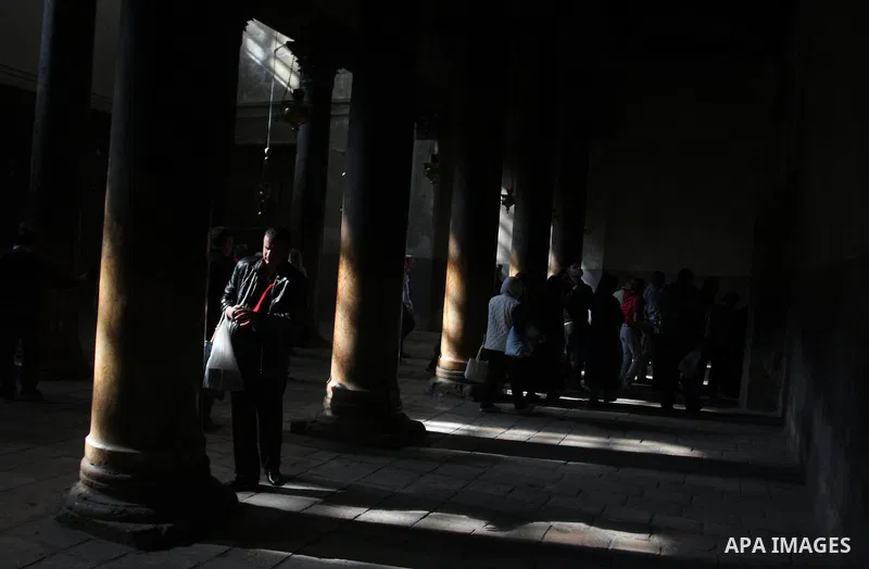 Christian pilgrims visit the Church of the Nativity in the biblical West Bank city of Bethlehem on 23 December 2011 as Christian pilgrims start gathering in the church belived to be the birthplace of Jesus Christ to cele...