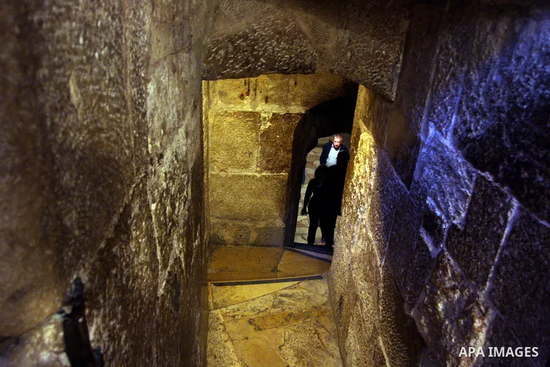 Christian pilgrims visit the Church of the Nativity in the biblical West Bank city of Bethlehem on 23 December 2011 as Christian pilgrims start gathering in the church belived to be the birthplace of Jesus Christ to cele...