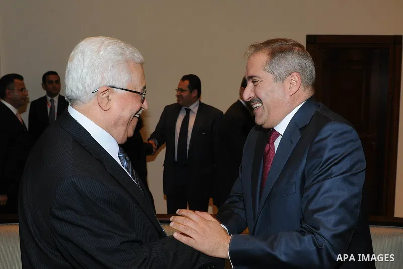 Palestinian President, Mahmoud Abbas (Abu Mazen) meets with Jordanian Foreign Minister, Nasser Judeh, in the west bank city of Bethlehem, on Dec. 24, 2011. Photo by Thaer Ganaim