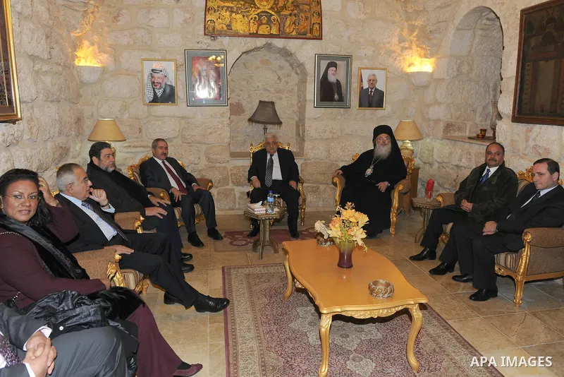 Palestinian President, Mahmoud Abbas (Abu Mazen) participante Mass held by the private community in the Church of St. Alangalkanh Grace in the west bank city of Bethlehem, on Dec. 24, 2011. Photo by Thaer Ganaim