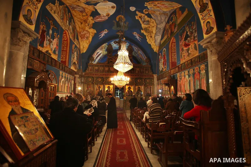 Palestinian Christians pray on Christmas day in the Saint Porfirios church in Gaza City December 25, 2011. Photo by Ashraf Amra