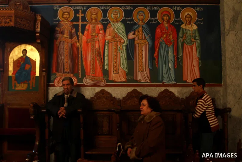 Palestinian Christians pray on Christmas day in the Saint Porfirios church in Gaza City December 25, 2011. Photo by Ashraf Amra