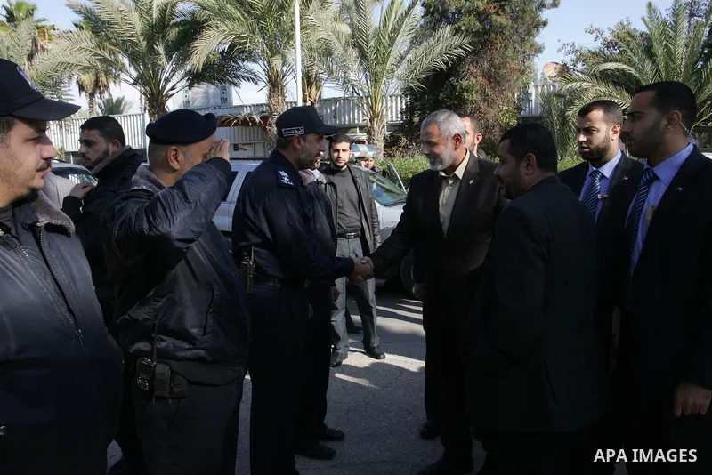 Palestinian Prime Minister in Gaza Strip, Ismail Haniya, arrived to the Rafah border crossing in the southern Gaza Strip on Dec 25, 2011. Haniya will go in foreign tour to participate in an international conference for J...
