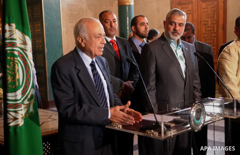 Arab league Secretary General, Nabil el-Arabi, left, meets with Gaza's Hamas Prime Minister, Ismail Haniyeh in Cairo, Egypt, Monday, Dec. 26, 2011. Photo by MOHAMMED AL-OSTAZ .