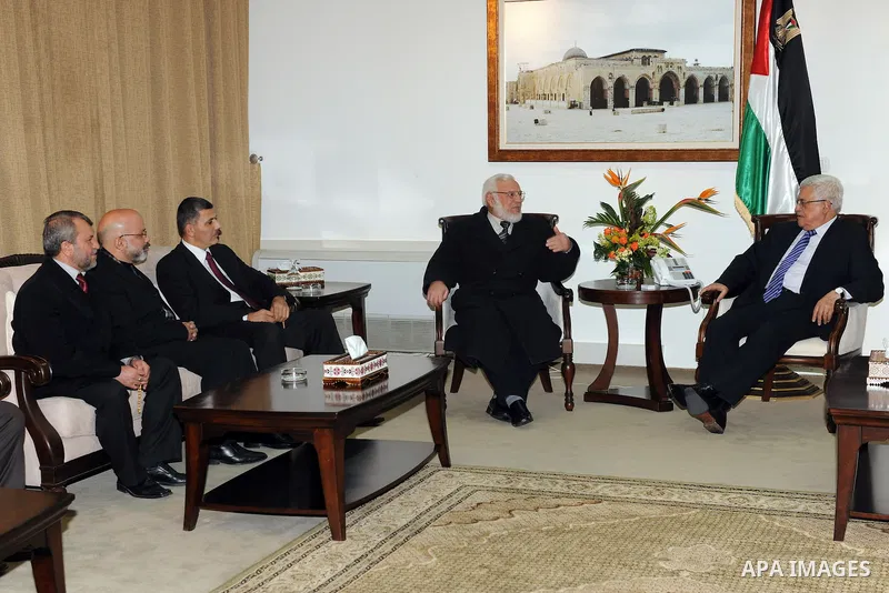 Palestinian President, Mahmoud Abbas (Abu Mazen), Receives a delegation from the list of change and reform of the parliamentary "pro-Hamas" in the West Bank city of Ramallah on Dec 26, 2011. Photo by Mufeed Abu Hasnah