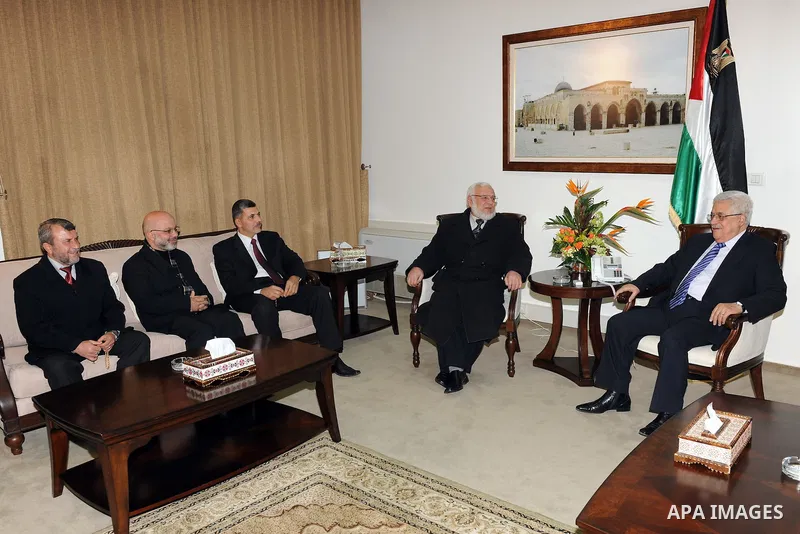 Palestinian President, Mahmoud Abbas (Abu Mazen), Receives a delegation from the list of change and reform of the parliamentary "pro-Hamas" in the West Bank city of Ramallah on Dec 26, 2011. Photo by Mufeed Abu Hasnah