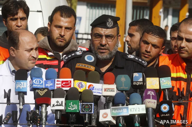 Head of the Palestinian civil defence, Youseef al-Zahar, speaks during a press conference in the third anniversary of the Israeli war on the Gaza Strip in Gaza city on Dec. 27,2011. Photo by Mahmud Nassar