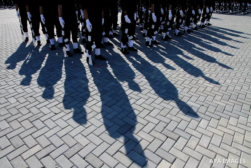 Palestinian members of Hamas security forces stand in formation during a graduation ceremony for new recruits in Gaza City on December 27, 2011. Photo by Asraf Amra