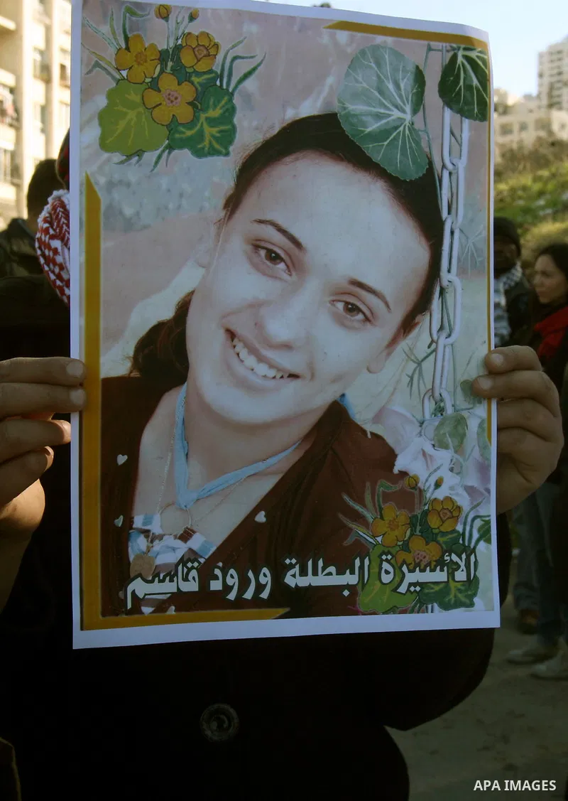 Palestinians participate in a demonstration in solidarity with prisoners jailed in Israel, in the West Bank city of Nablus, Wednesday ,Dec. 28, 2011. Photo by Wagdi Eshtayah.
