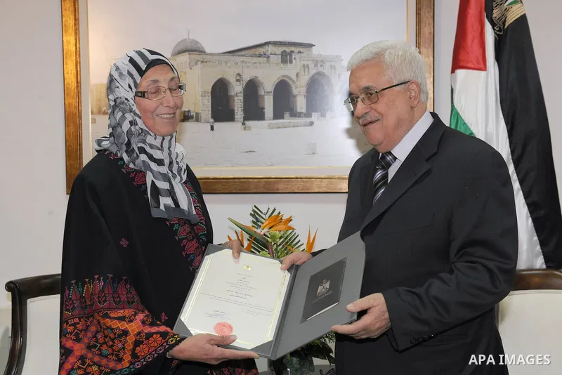 Palestinian President, Mahmoud Abbas (Abu Mazen), granted the Order of Merit and excellence of the late former President of the Teachers Union. Jamil Shehadeh, in the West Bank city of Ramallah on Dec 27, 2011. Thaer Gha...