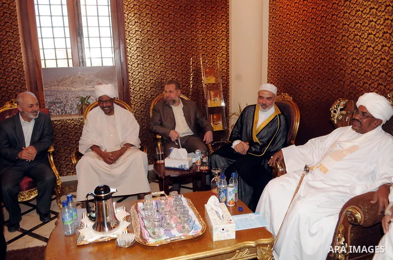 Sudanese President Omar al-Beshir meets with Palestinian Prime Minister in gaza, Ismail Haniyeh, in the Sudan's capital of Al-Khartoum on December 30, 2011. Photo by Mohamad Ostaz