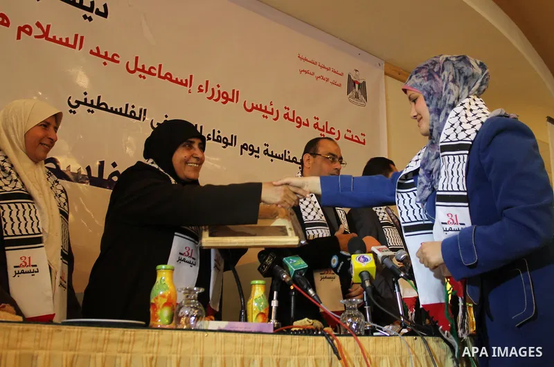 Palestinian government Information Office, honoring women journalists during a ceremony in Gaza City on Dec 31,2011. Photo by Mohammed Asad