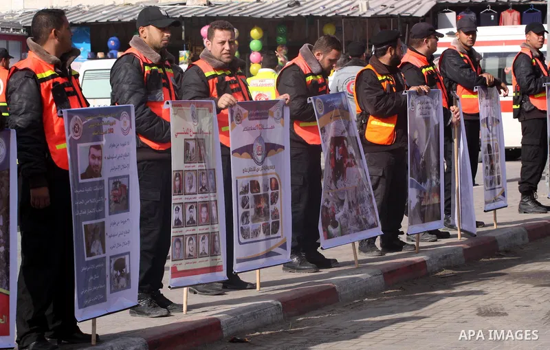 Members of the Palestinian Civil defence demonstrate their skills during a training session following the campaign "your safty" in Gaza City, on Jan. 04, 2012. Photo by Mohammed Asad