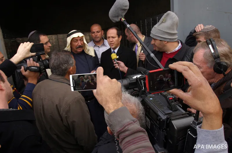 Jerusalem Mayor Nir Barkat, visit the Issawiya neighborhood in east Jerusalem, Wednesday, Jan. 4, 2012. Minor clashes erupted Wednesday after Jerusalem Mayor Nir Barkat visited an east Jerusalem neighborhood, between Isr...
