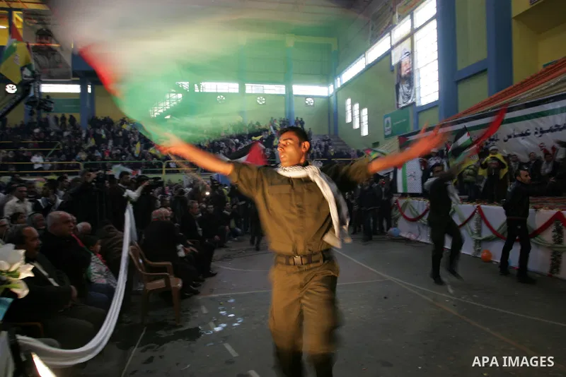Palestinians celebrate during a mass wedding organized by the Fatah movement for around 40 released Palestinian prisoners in Rafah refugee camp in the southern Gaza Strip on January 5, 2012. Photo by Abed Rahim Khatib
