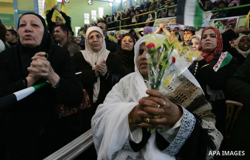 Palestinians celebrate during a mass wedding organized by the Fatah movement for around 40 released Palestinian prisoners in Rafah refugee camp in the southern Gaza Strip on January 5, 2012. Photo by Abed Rahim Khatib