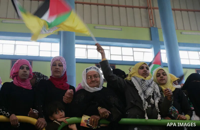 Palestinians celebrate during a mass wedding organized by the Fatah movement for around 40 released Palestinian prisoners in Rafah refugee camp in the southern Gaza Strip on January 5, 2012. Photo by Abed Rahim Khatib