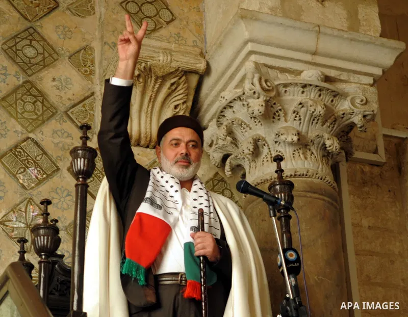 Palestinian prime minister in gaza Ismail Haniya prays as he visits the Zitouna mosque on January 6, 2012 in Tunis on the second day of a visit to Tunisia. The Hamas leader is in Tunisia as part of a six-country tour. He...