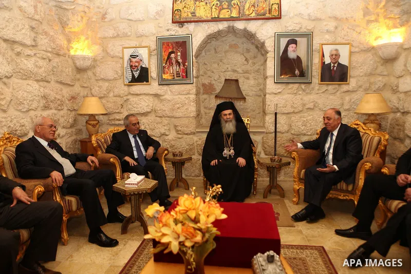 Palestinian Prime Minister Salam Fayyad Participate in the " Gala dinner" the Christmas procession inside the Church of the Nativity in the West Bank town of Bethlehem January 6, 2012. Photo by Mustafa Abu Dayeh
