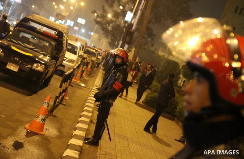 Military police guard the streets during the Coptic Christmas eve mass at the main cathedral in Cairo January 6, 2012. Egypt's Christians are celebrating their first Christmas Mass after the public uprising that ousted P...