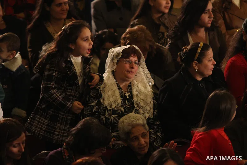 Egyptian Coptic Christians attend the Coptic Christmas midnight mass at Abbassiya Cathedral in Cairo on January 6, 2012. A massive plan to protect Egyptian churches swung into action ahead of the Christmas eve mass lead...